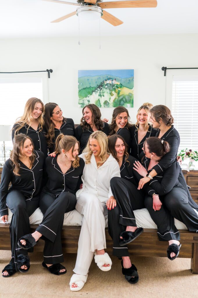 Bridesmaid sitting on bed 